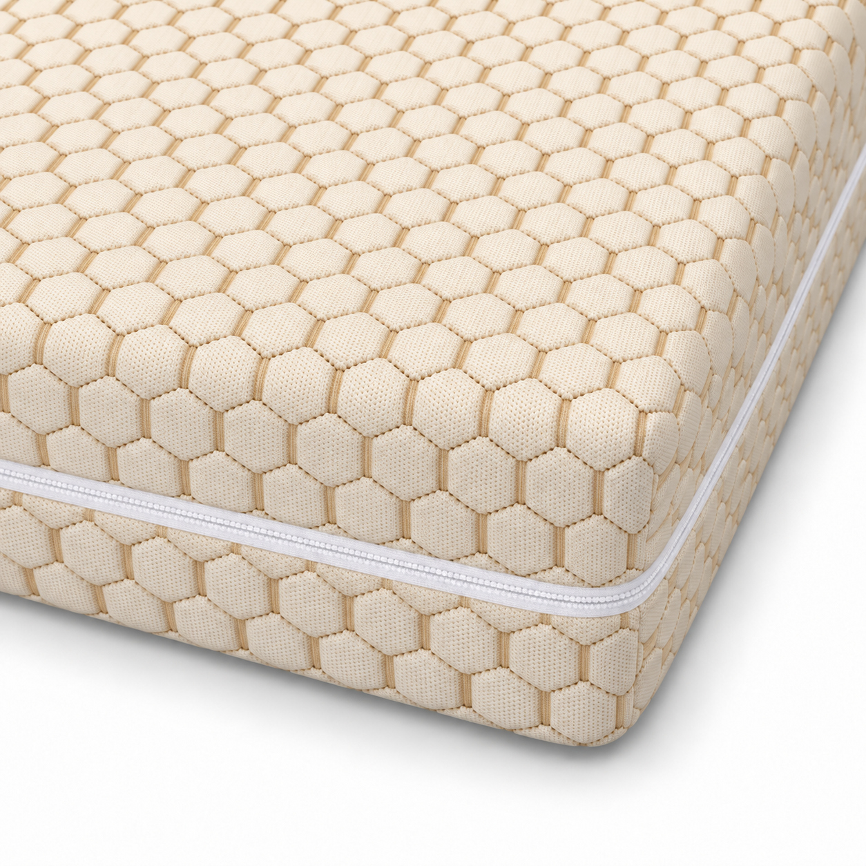 Close-up of the Essentials cream hexagonal mattress cover and side zip
