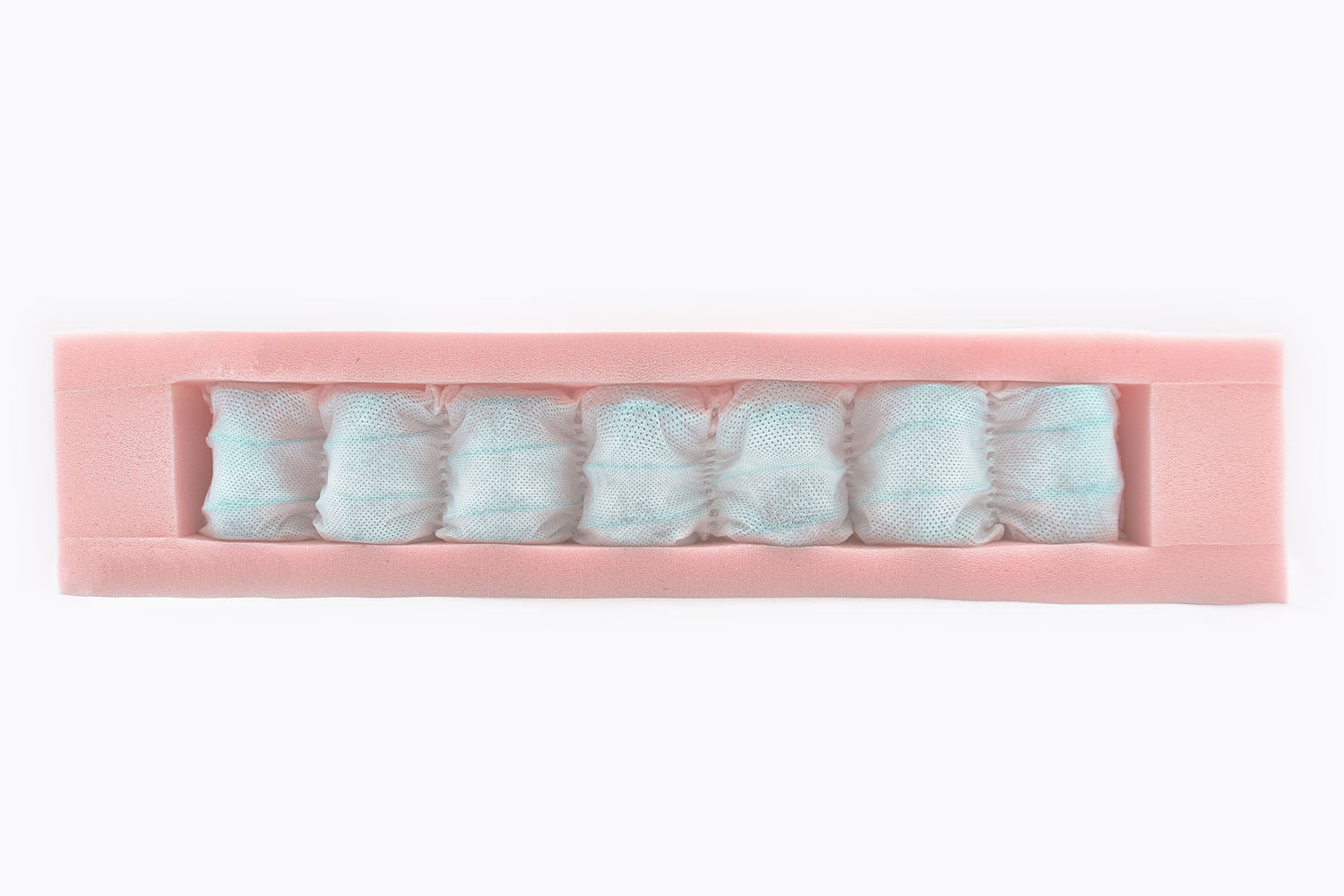 Foam with pocket springs